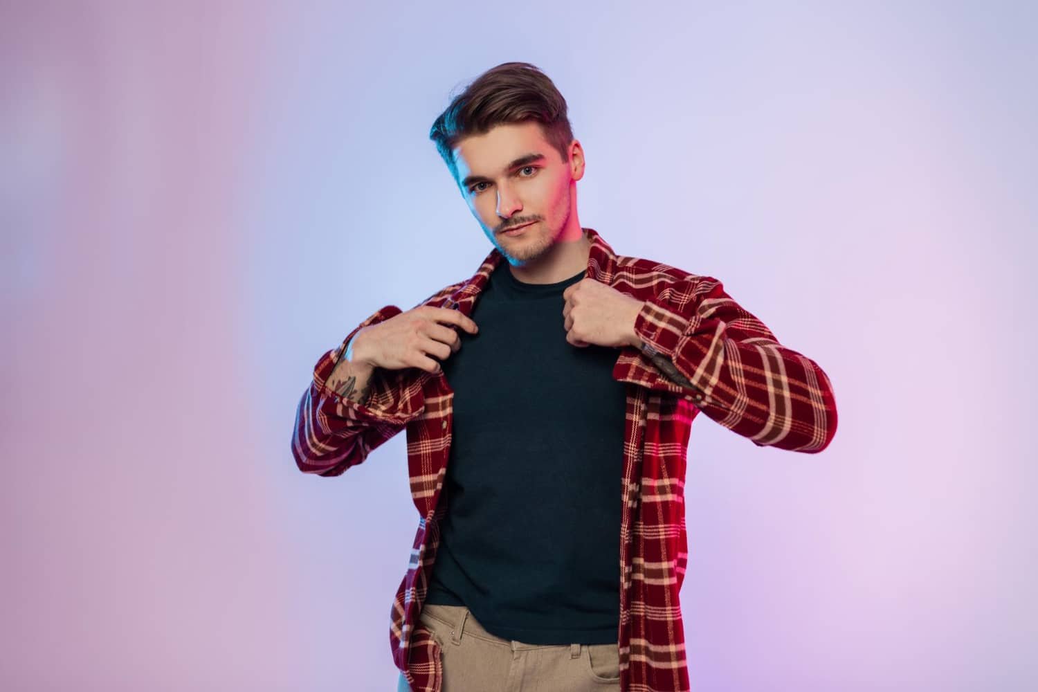Confident Individual Showcasing Shirt With Copy Space For Design